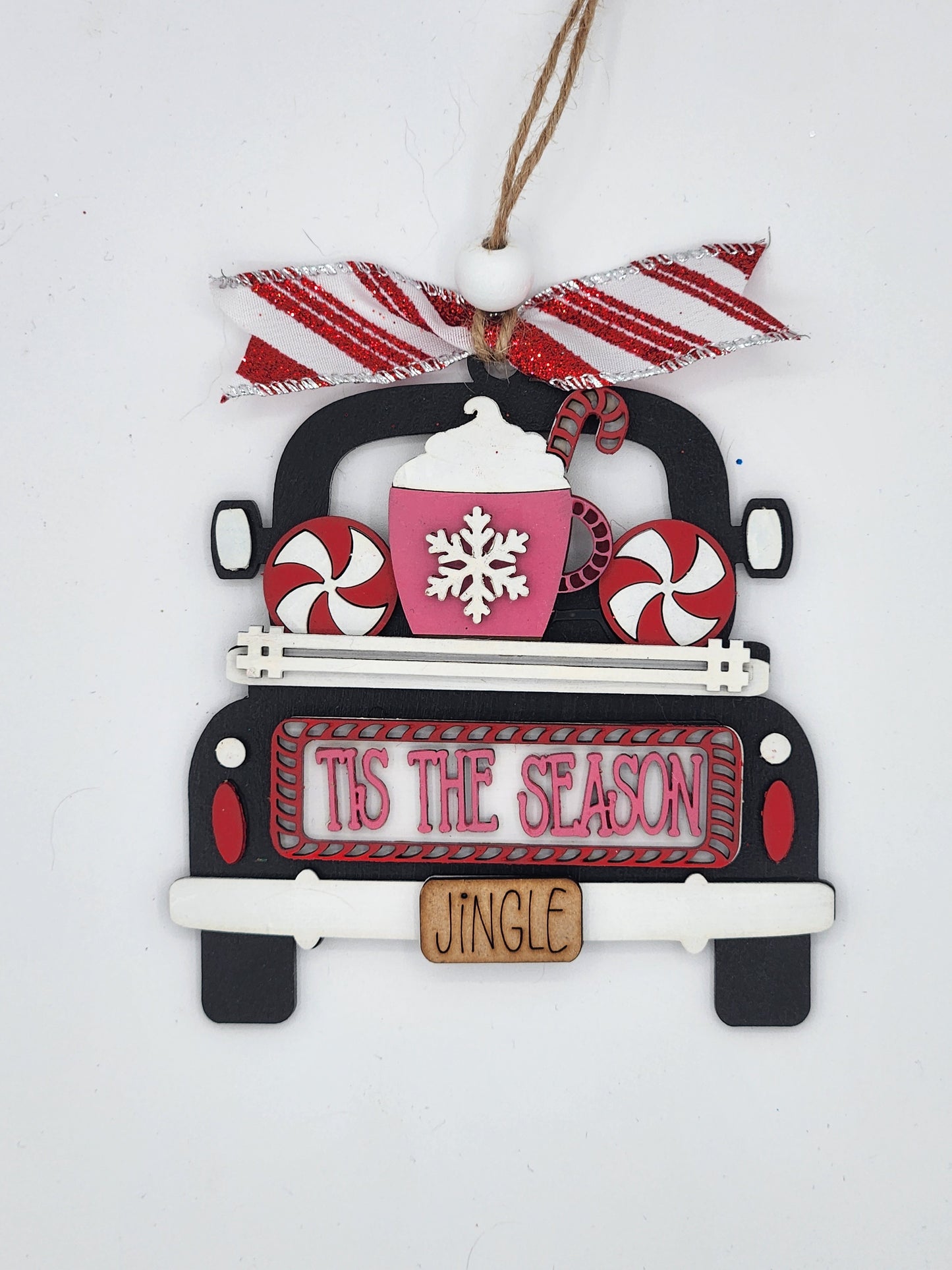 Truck Ornament that says Tis The Season with hot cocoa and peppermint candies in the truck bed