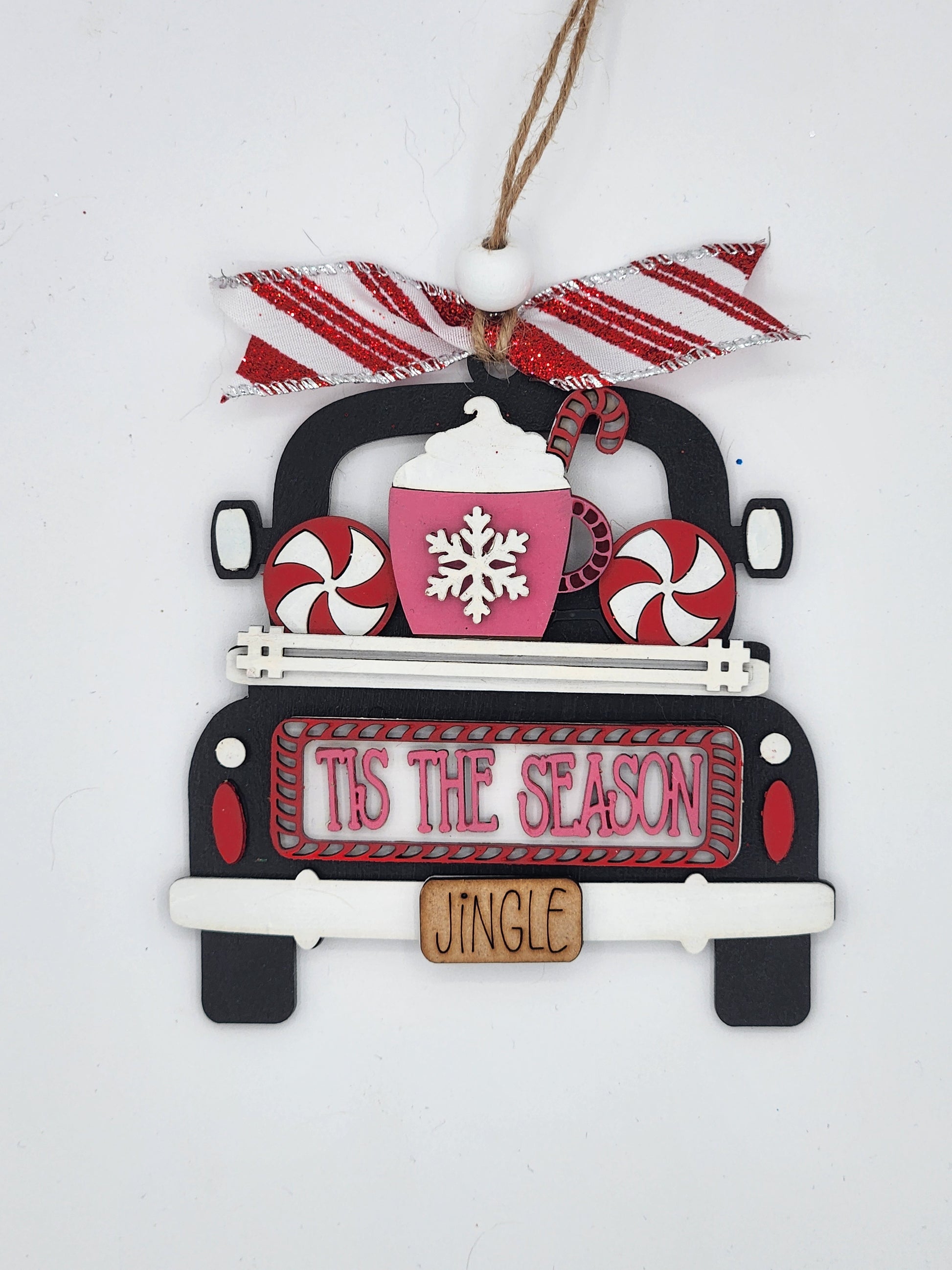 Truck Ornament that says Tis The Season with hot cocoa and peppermint candies in the truck bed