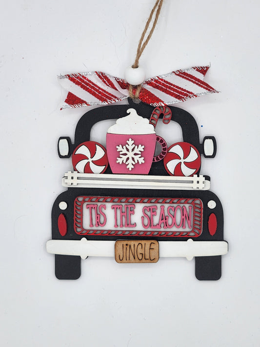 Truck Ornament that says Tis The Season with hot cocoa and peppermint candies in the truck bed