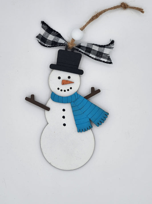 Decorative snowman ornament with a blue scarf and black hat