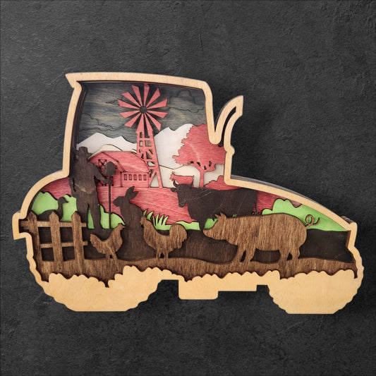 Wooden tractor shaped with farm scenes on a dark background